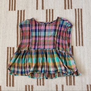 Colorful plaid sleeveless top. Oversized fit.
